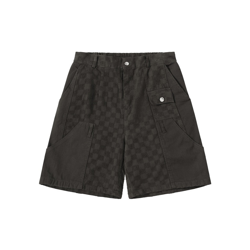 Dark gray knee-length shorts with checkerboard jacquard center panels, flap pocket and button closure, flat front view