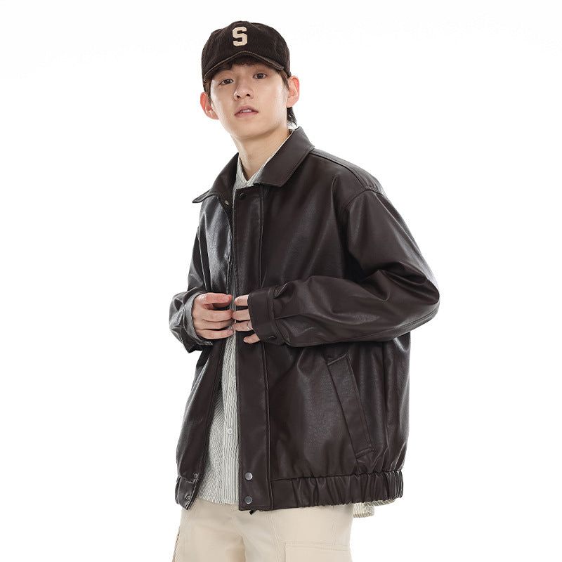 Model wearing a dark brown collared jacket with a snap-front placket, elastic hem and angled pockets.