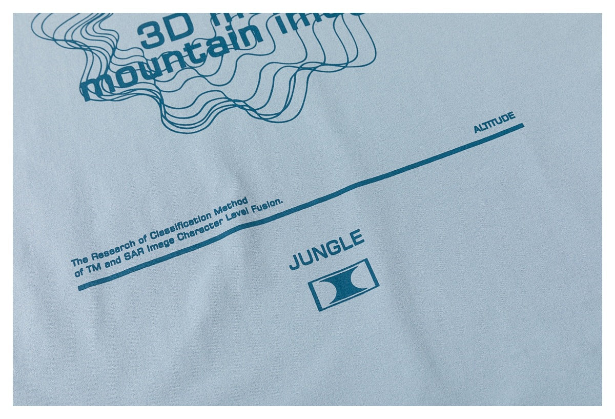 Close-up of a light blue shirt print with English text, a long line, and a small graphic logo.