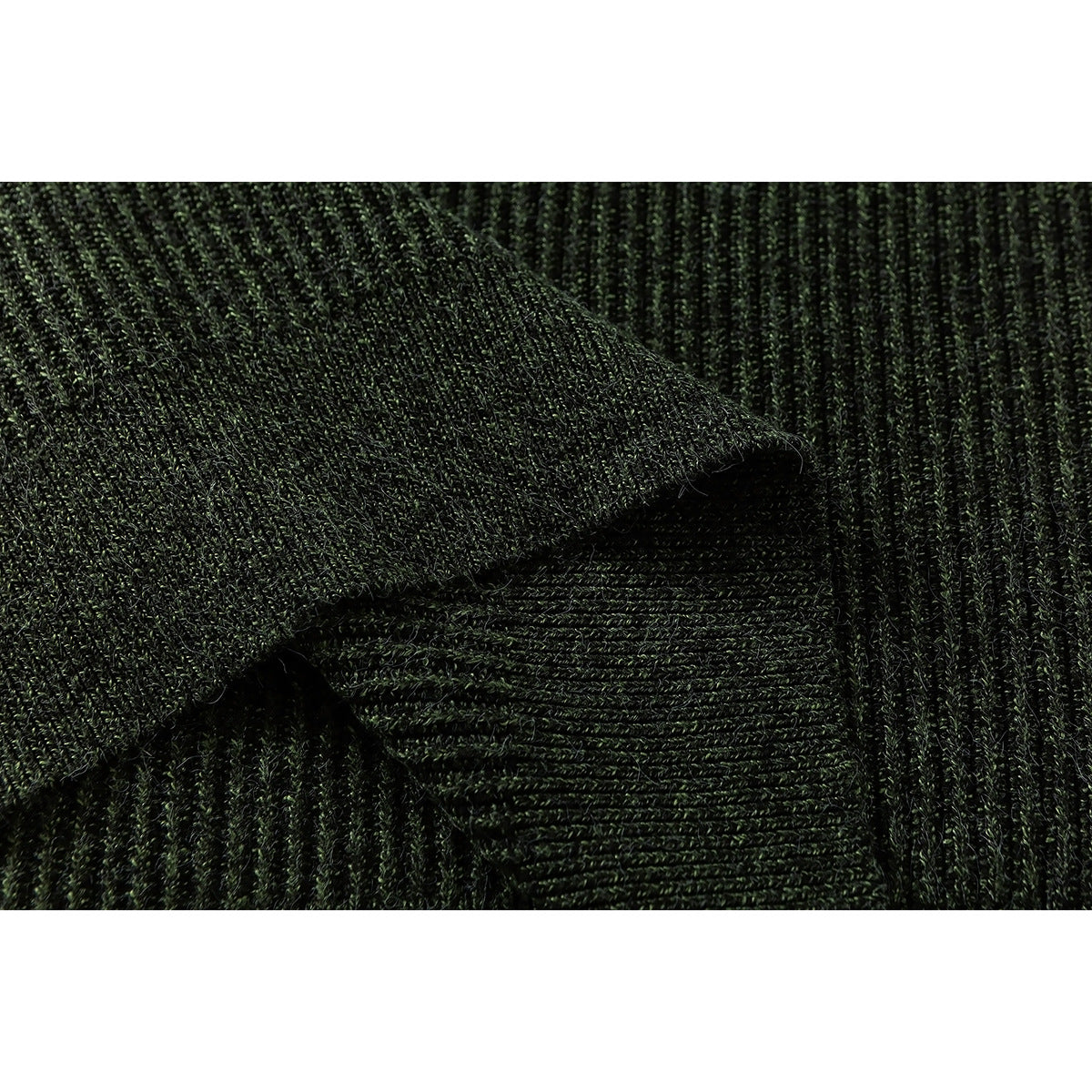 Close-up of dark green rib-knit sweater fabric and a folded edge.