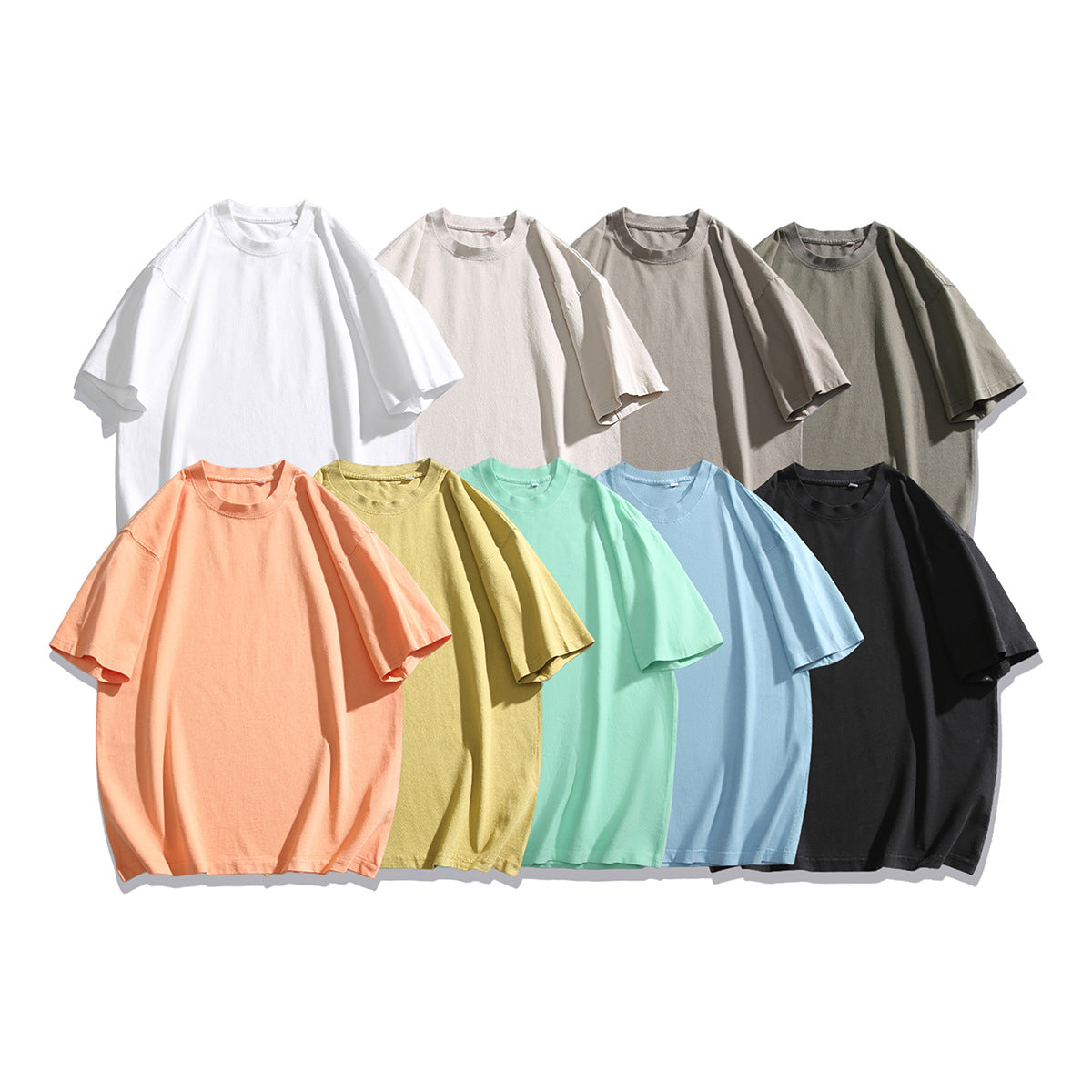 Nine plain oversized short-sleeve T-shirts displayed in white, neutral, orange, yellow, mint, blue, and black colorways.