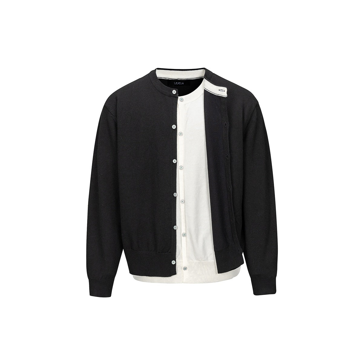 Black knit cardigan with white inner layer, round neck and button front, flat front view