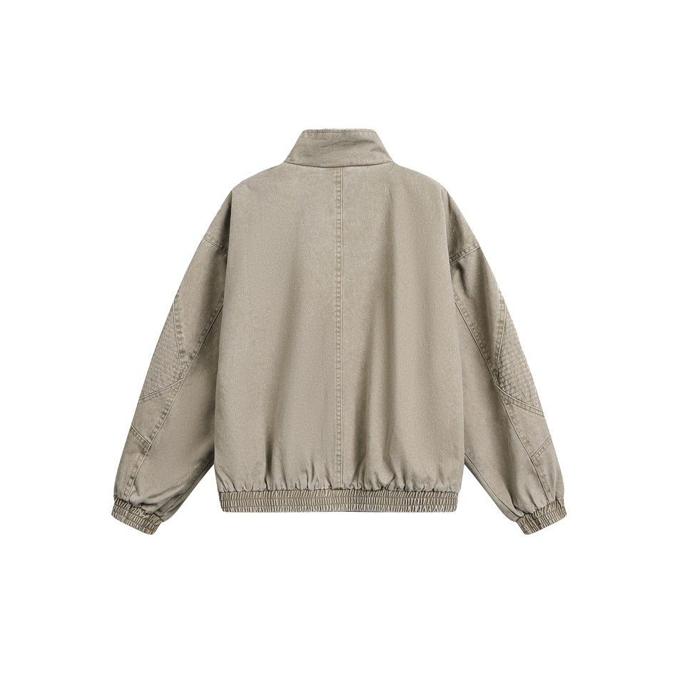 Back view of khaki washed stand-collar jacket with center seam, textured sleeve panels and elastic hem