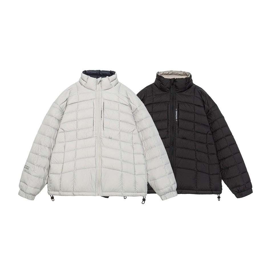 Light gray and black quilted zip-up jackets shown side by side from the front.