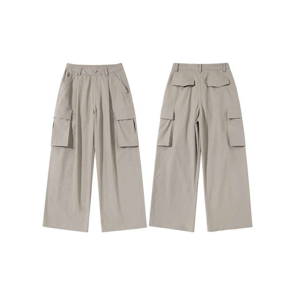 Flat lay showing the front and back of taupe wide-leg cargo pants with flap pockets and belt loops.