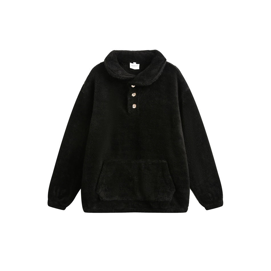 Black plush fleece-like pullover with collar, three buttons and front pocket, flat lay