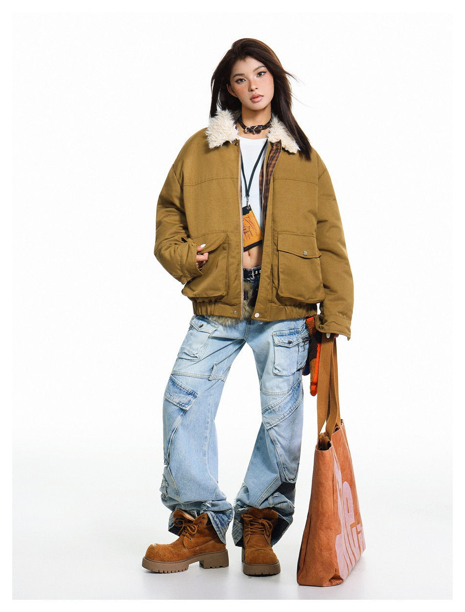 Full-length model wearing an open ochre jacket with a cream faux-fur collar, flap pockets and light-wash cargo jeans.