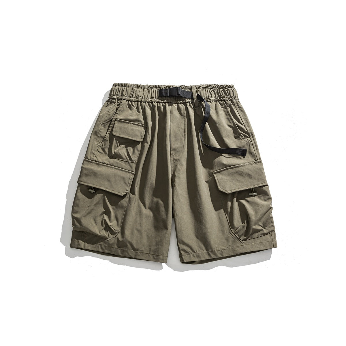 Olive-brown cargo shorts flat lay with elastic waist, black belt buckle and large flap pockets