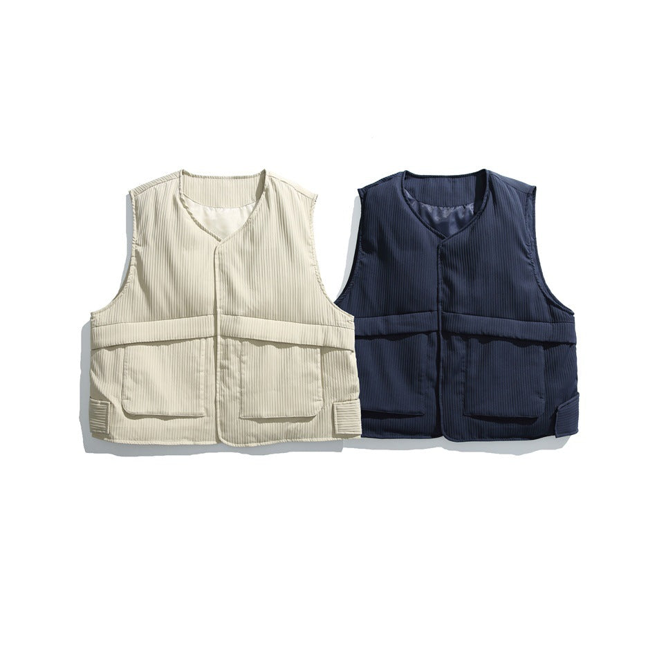 Two sleeveless V-neck utility vests shown side by side in ivory and navy, each with front pockets.