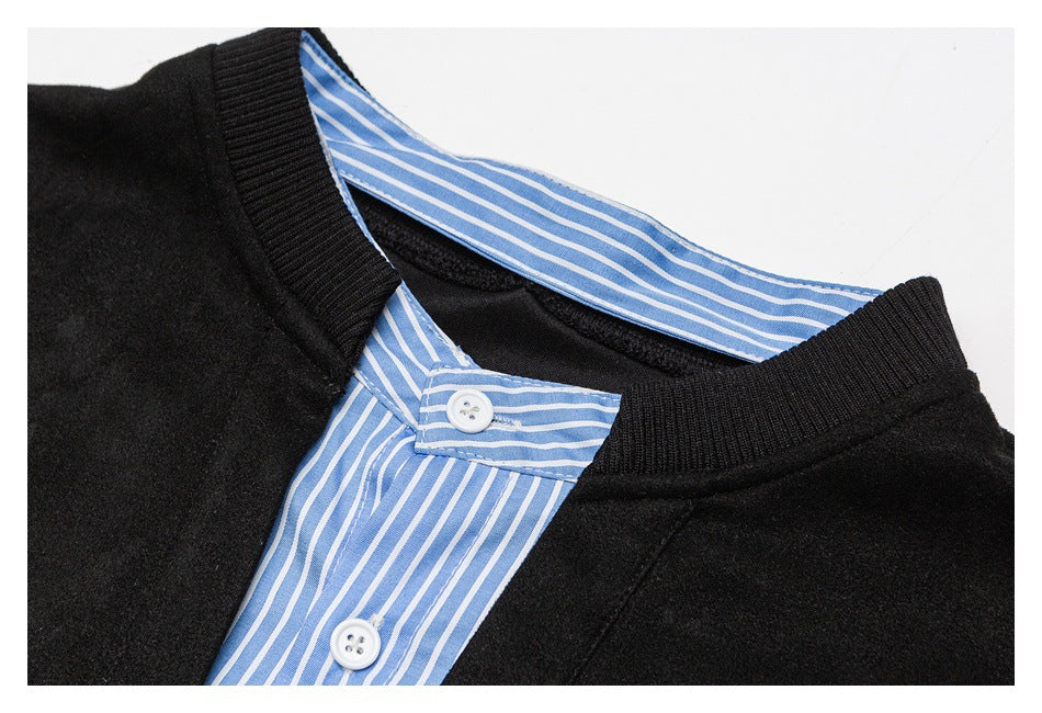 Close-up of a black ribbed neckline and blue-and-white striped button placket with white buttons.