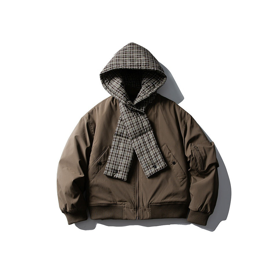 Brown bomber-style jacket with plaid hood and plaid scarf panel crossed over the front, flat lay