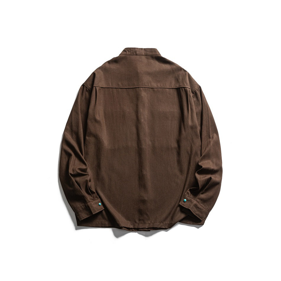Back view of a brown long-sleeve shirt with a stand collar and turquoise cuff buttons.