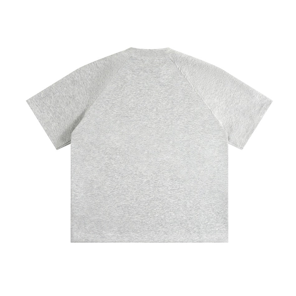 Back view of a heather gray short-sleeve shirt with raglan seams and a plain body.