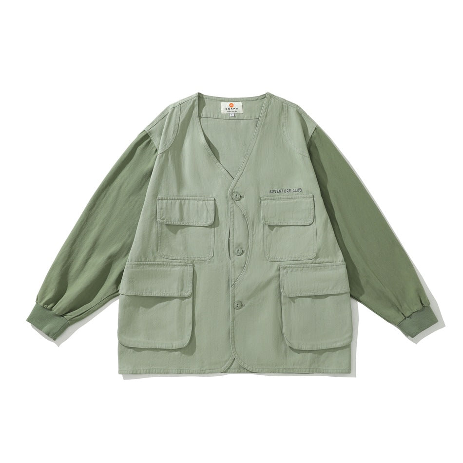 Sage green collarless V-neck jacket with four flap pockets, button front and ribbed cuffs, flat lay front view