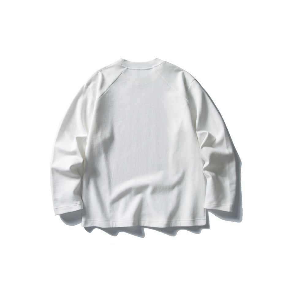 Back view of a plain white long-sleeve crewneck sweatshirt laid flat.