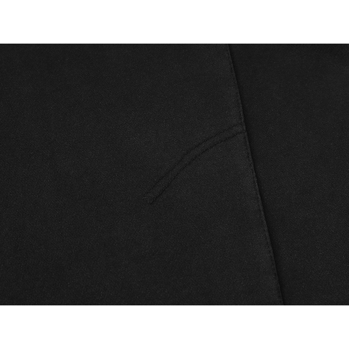 Close-up of black sweatshirt fabric and a curved stitched seam.