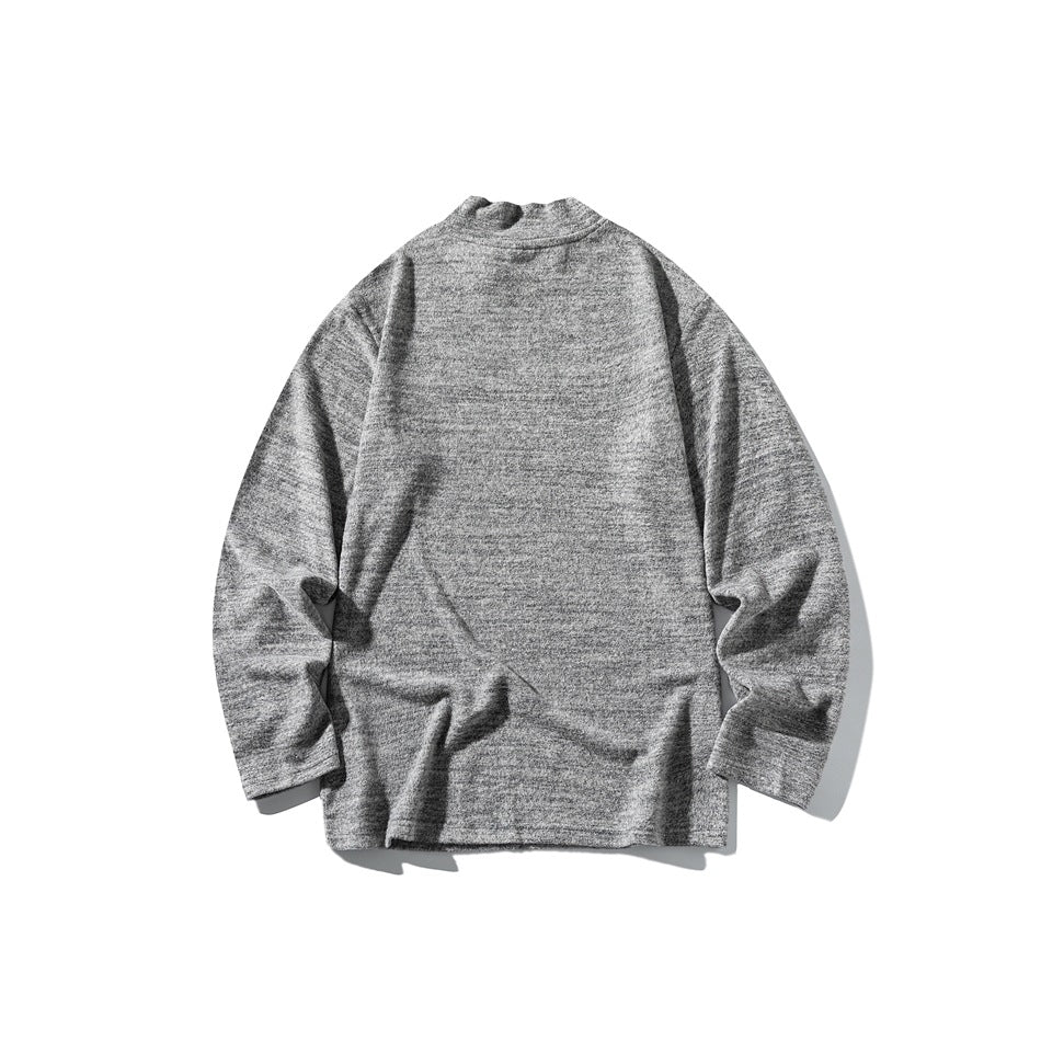 Heather gray mock neck long-sleeve top laid flat on a white background