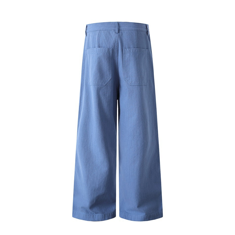 Full rear view of light blue wide-leg pants with two large back pockets and belt loops on a white background.