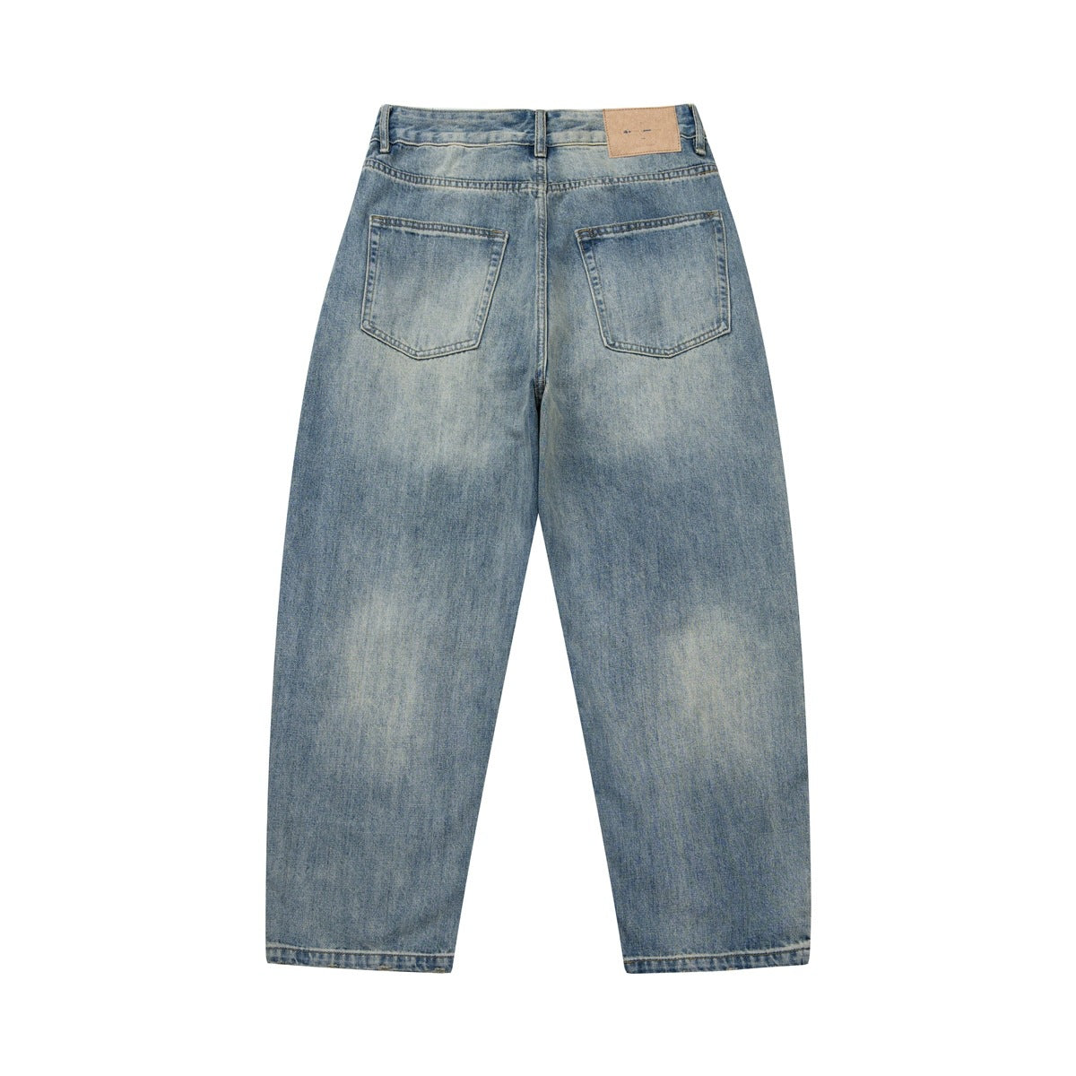 Full back view of faded blue jeans with two patch pockets and a tan waistband patch.