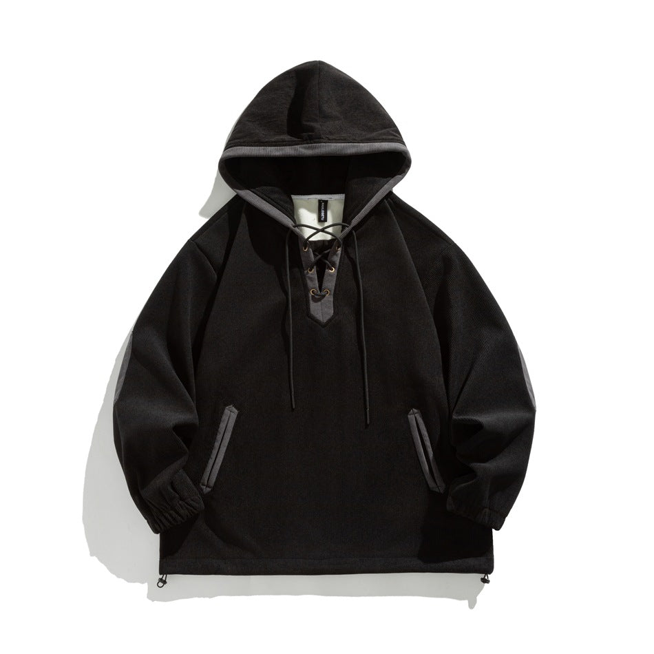 Black ribbed hoodie with gray trim, lace-up V-neck with eyelets, trimmed pockets and drawstring hem, flat lay