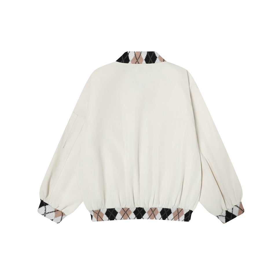 Back view of apricot bomber-style jacket with argyle knit collar, cuffs and gathered hem on white background