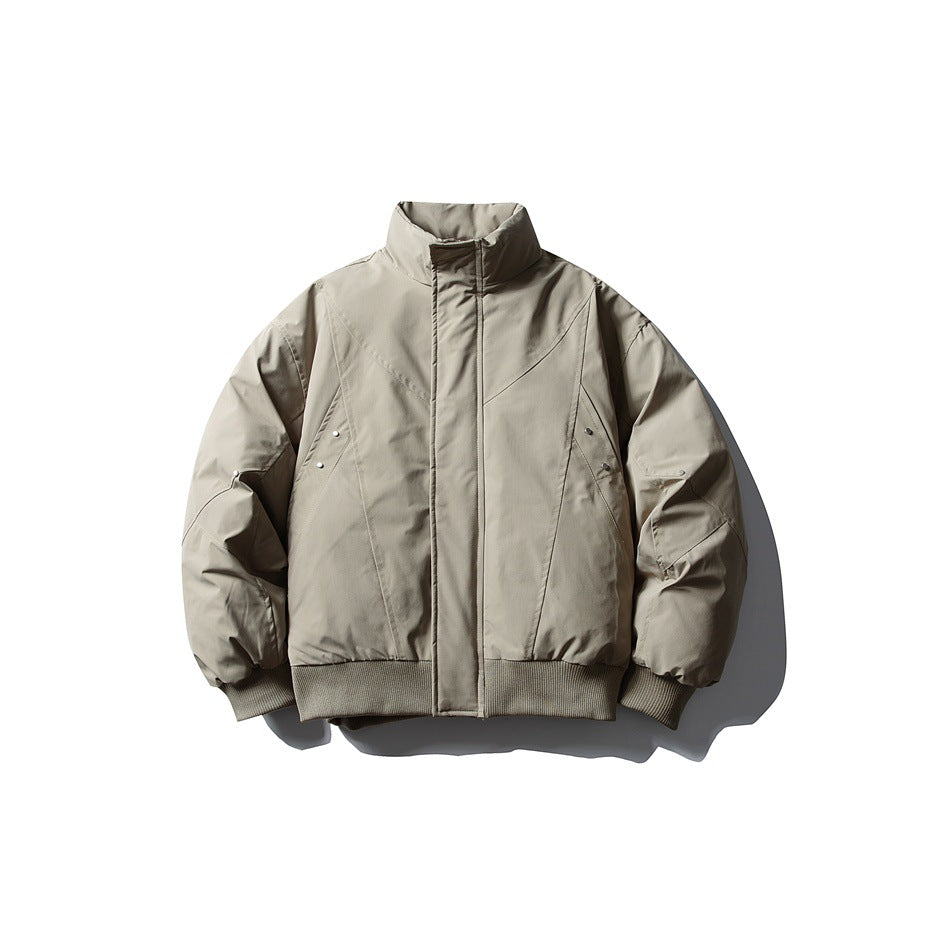 Light khaki stand-collar zip jacket, flat front view, with seam paneling, metal studs and ribbed cuffs and hem