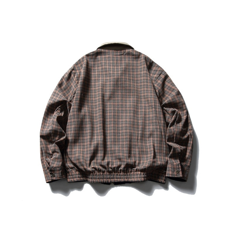 Back view of a brown and black plaid jacket with long sleeves and an elasticized hem, photographed on white.