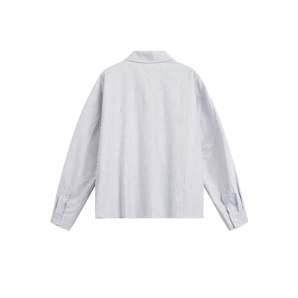 Back view of a long-sleeved button-up shirt with fine gray vertical stripes and a folded collar.