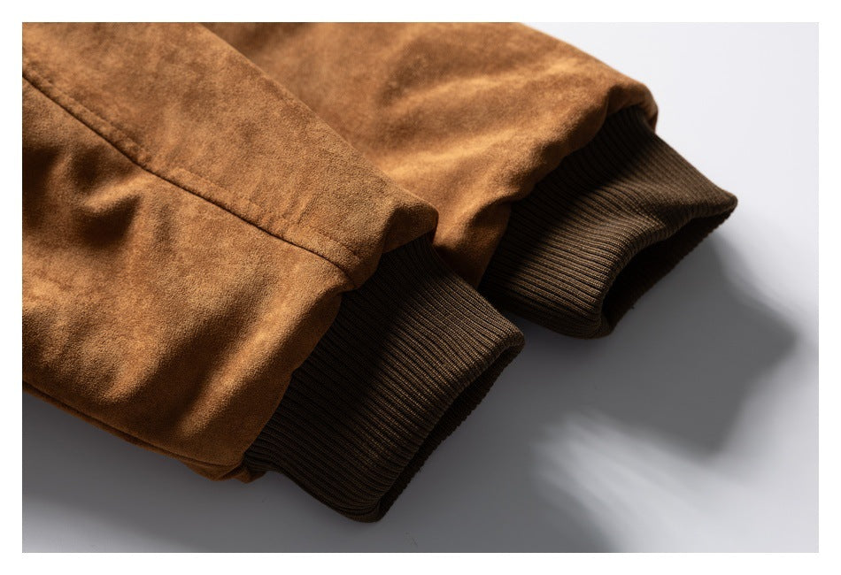 Close-up of the brown jacket's sleeves with dark ribbed knit cuffs.