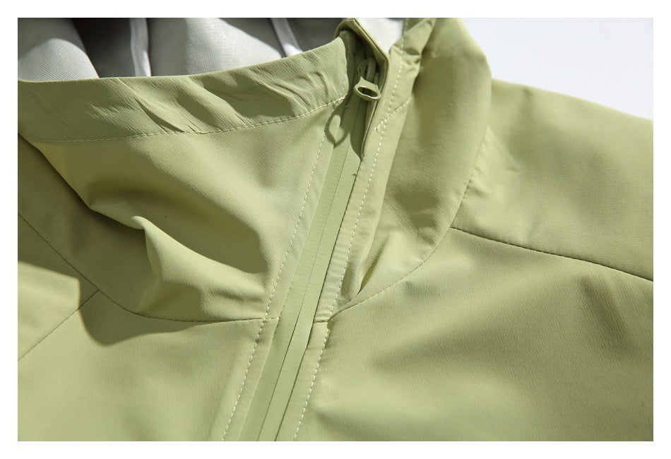 Close-up of the jacket's hood, collar, and front zipper stitching.