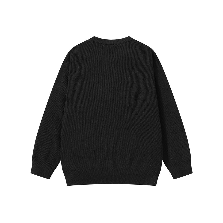 Black ribbed knit sweater, flat lay back view with round neckline and ribbed cuffs and hem
