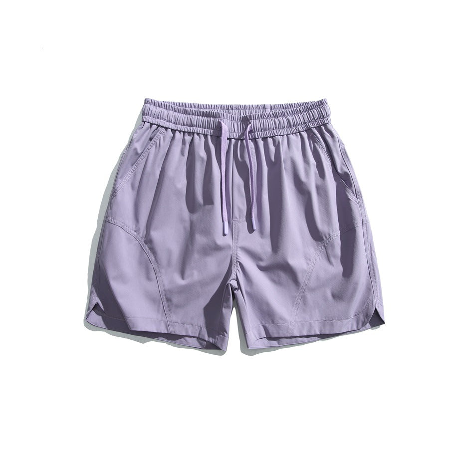 Light purple drawstring shorts with matching lilac drawstring and elastic waistband, flat front view