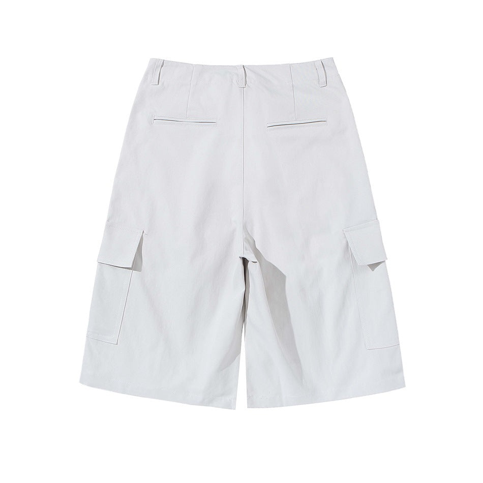 Back view of white cargo shorts with two welt pockets and flap cargo pockets.