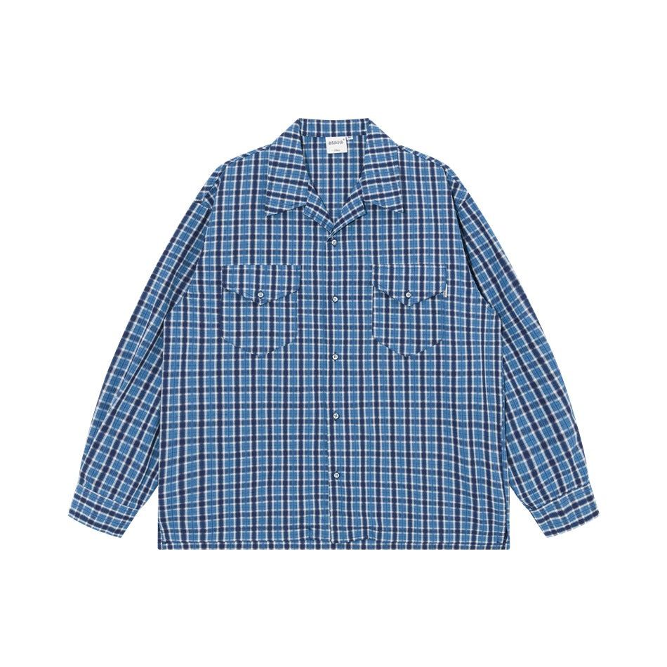 Blue plaid long-sleeve button-front shirt with camp collar and two flap chest pockets, front flat view