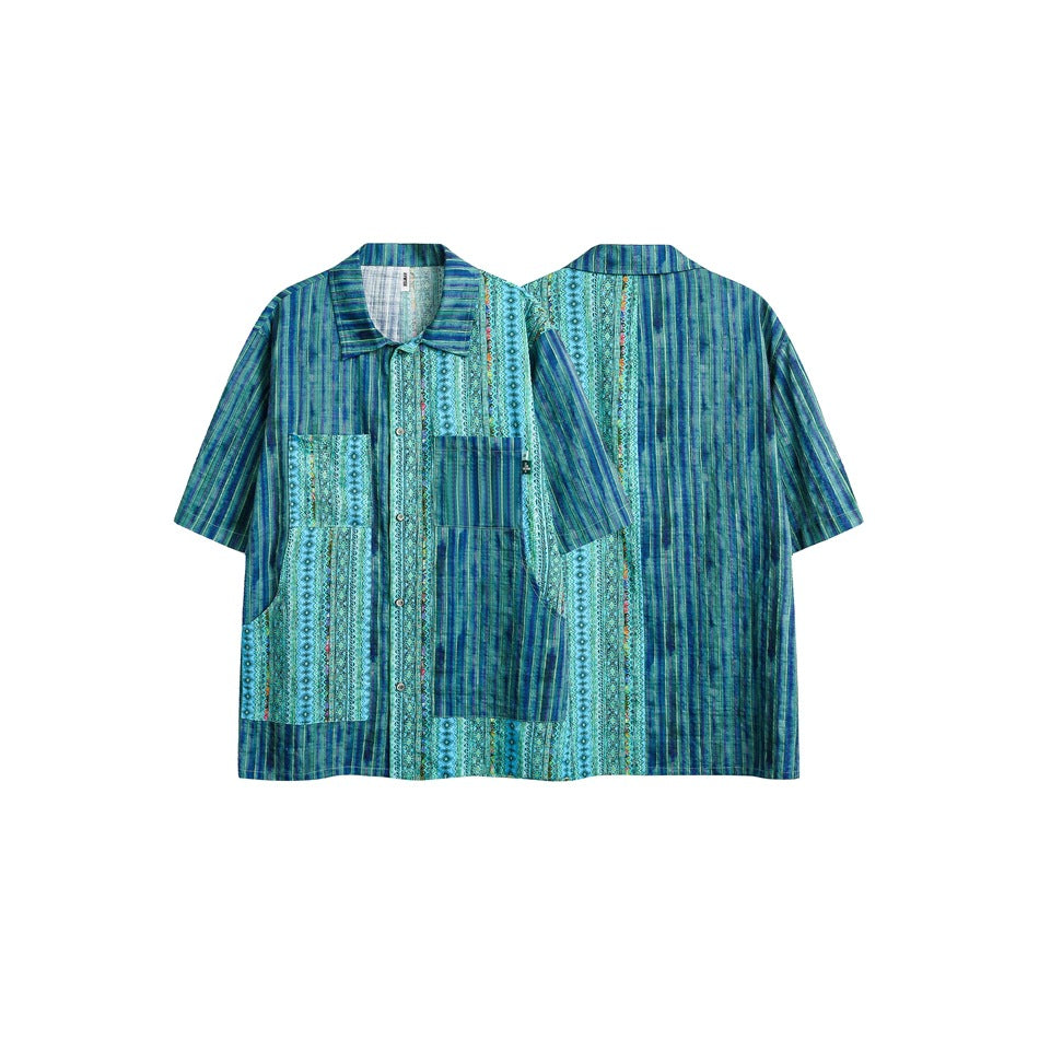 Blue and turquoise short-sleeve button-front tunic shown from the front and back, with striped and geometric panels.