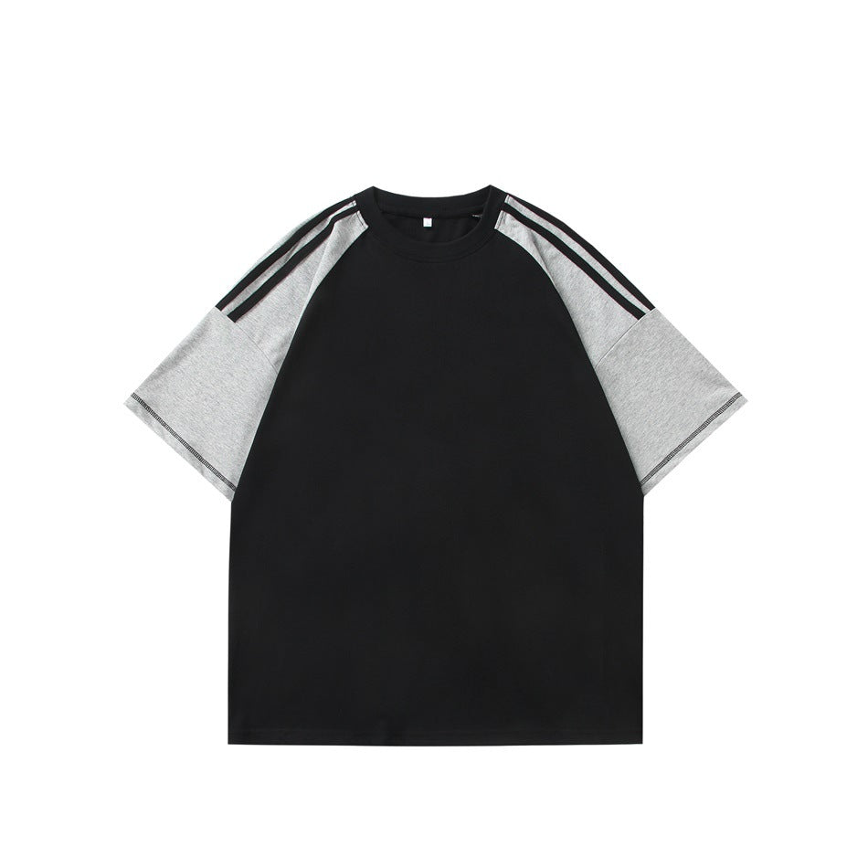 Black crew-neck T-shirt with heather gray raglan sleeves, black shoulder stripes and dark contrast stitching at the sleeve
