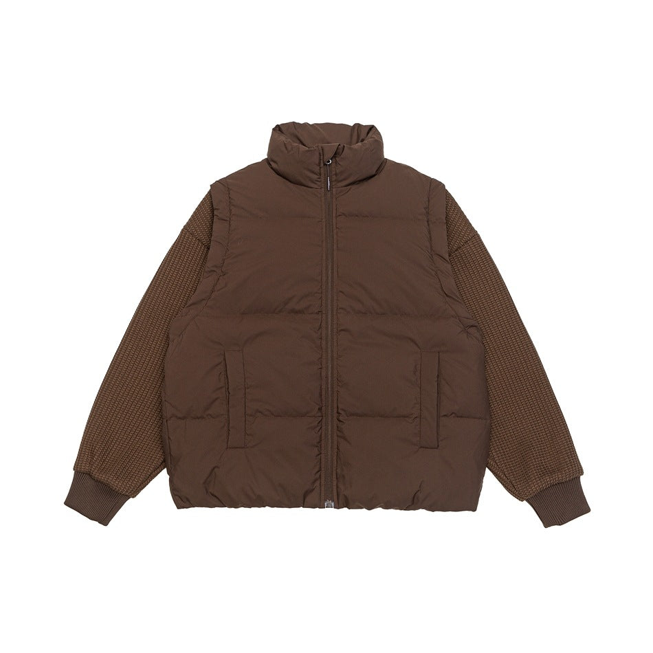 Brown quilted puffer jacket with stand collar, front zipper, pockets and waffle-knit sleeves with ribbed cuffs