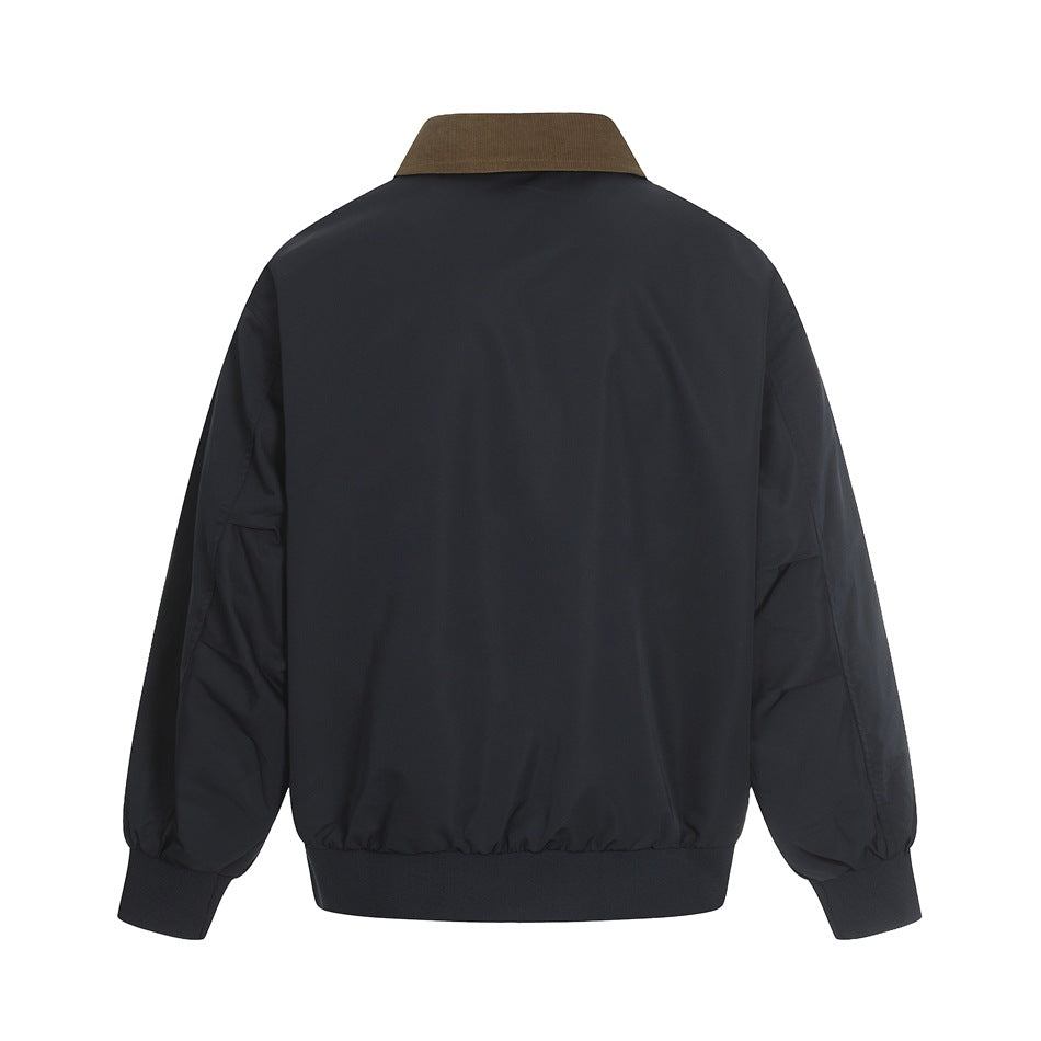 Back view of a dark navy jacket with a contrasting brown collar, ribbed cuffs, and ribbed hem.