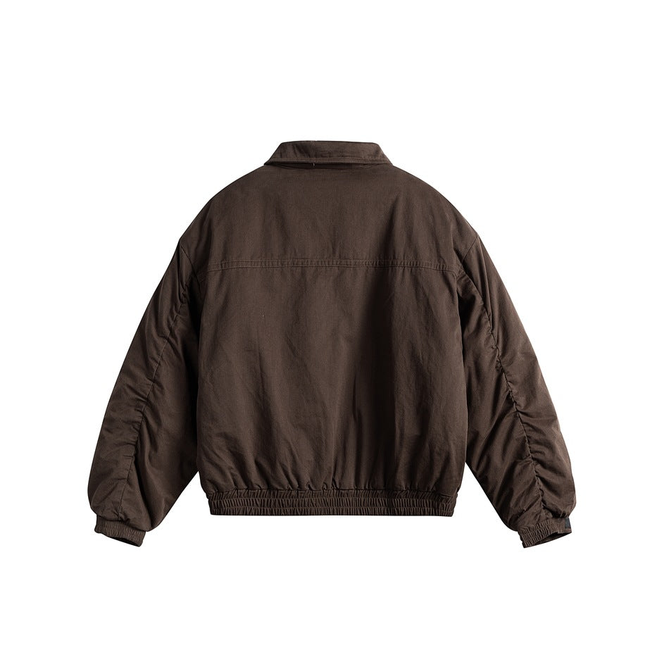 Coffee brown jacket back view with yoke seam, ruched sleeve seams and elasticized hem and cuffs