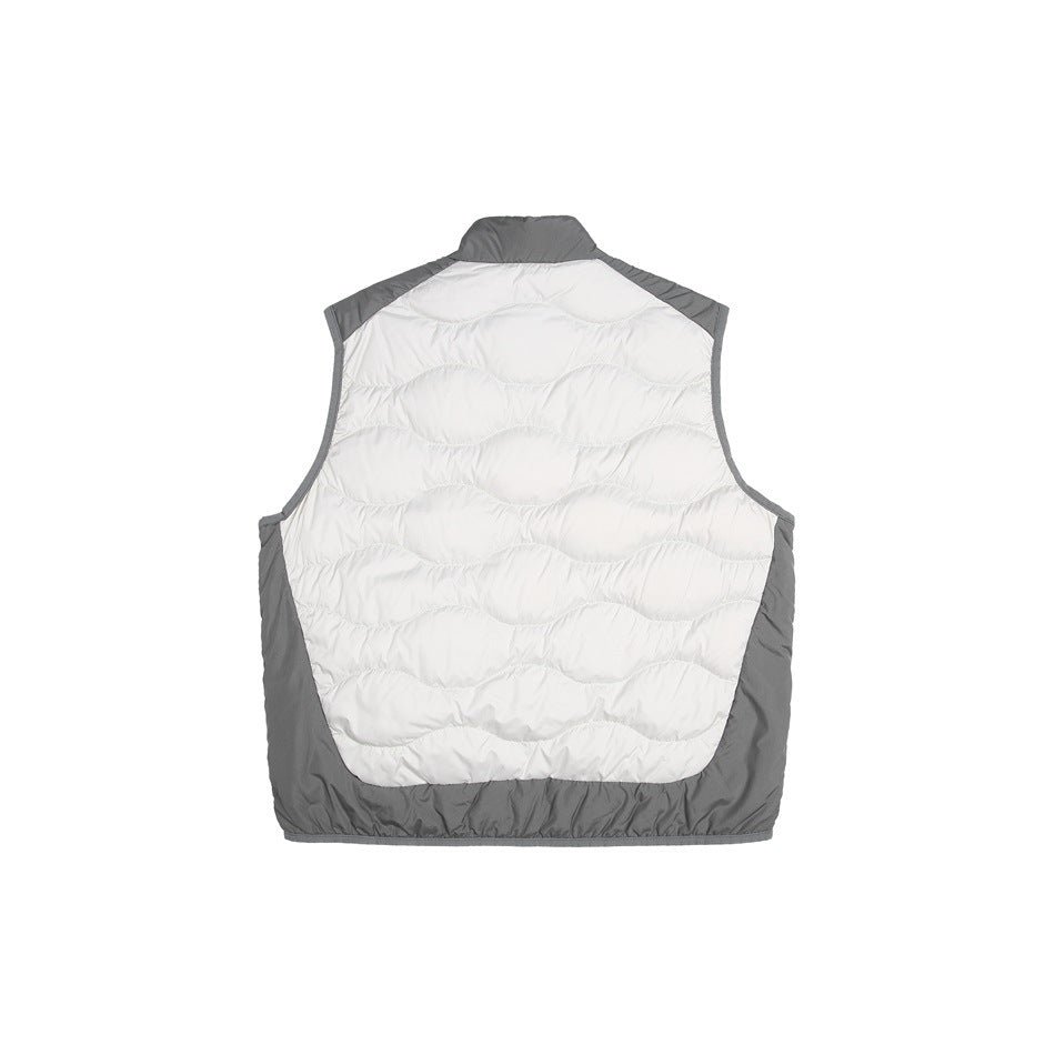 Back view of a white quilted sleeveless vest with gray side, shoulder, and hem panels.