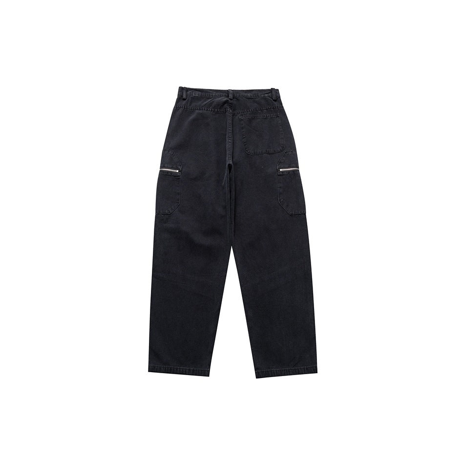Back view of black relaxed-fit trousers with a rear pocket and zippered side cargo pockets.