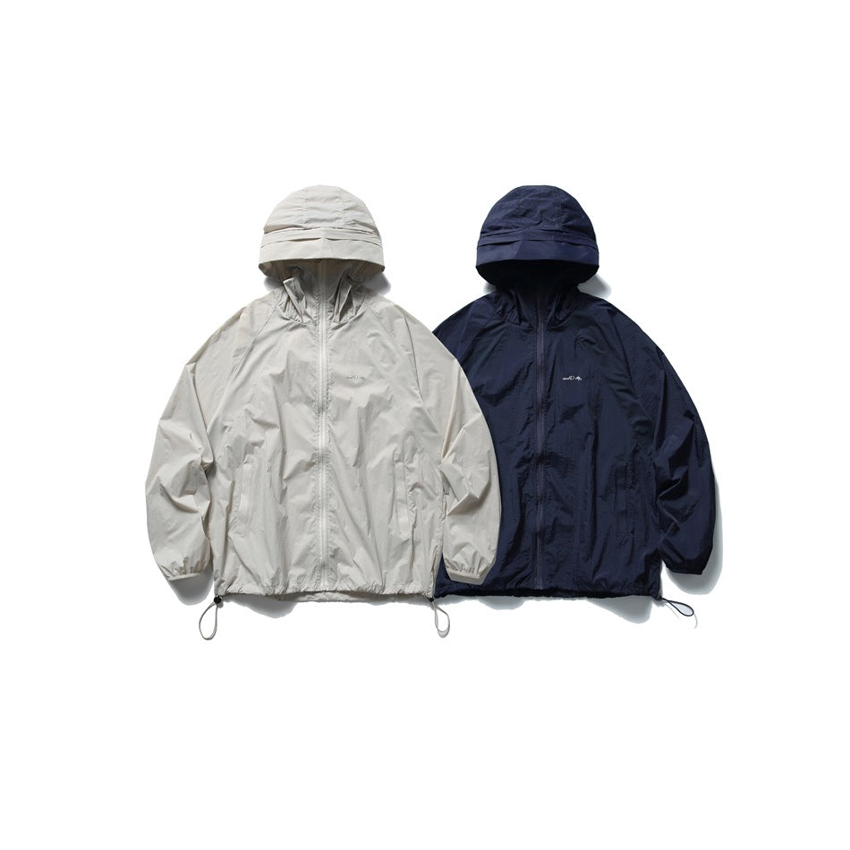 Front flat lay of two hooded jackets in light beige and navy, with zip fronts and adjustable hems.