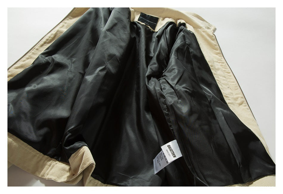 Cream ribbed jacket opened flat to show its dark lining, sleeves, zipper edges, and attached tags.