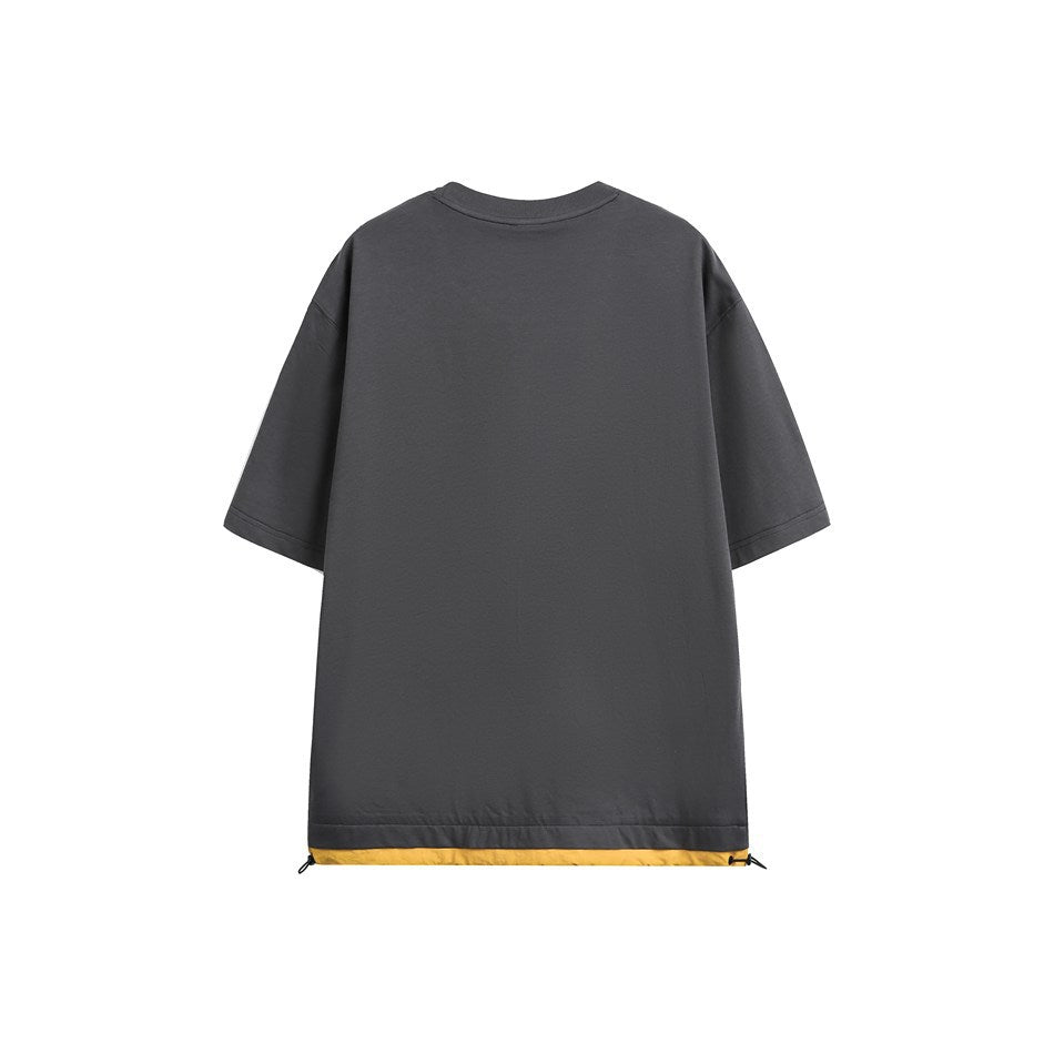 Back view of dark gray T-shirt with yellow hem band and drawcord toggles at the corners