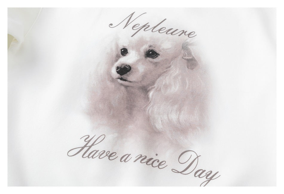 White sweatshirt chest print featuring a watercolor dog with “Neptune” above and “Have a nice Day” below.