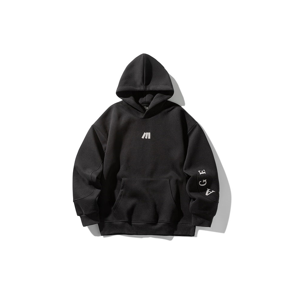 Black pullover hoodie flat lay with kangaroo pocket, ribbed cuffs and hem, and small light gray chest logo