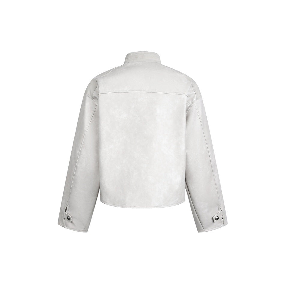 Back view of a light gray cropped jacket with a stand collar, curved yoke seam, and snap-tab cuffs.