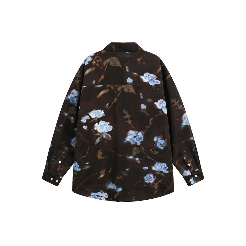 Back view of a dark brown long-sleeve button-up shirt with a blue and pale floral print.