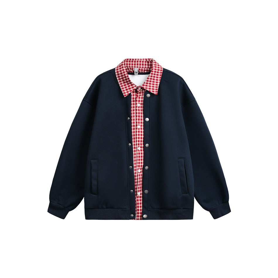 Navy snap-front jacket with red and white gingham shirt layer at collar and placket, flat lay