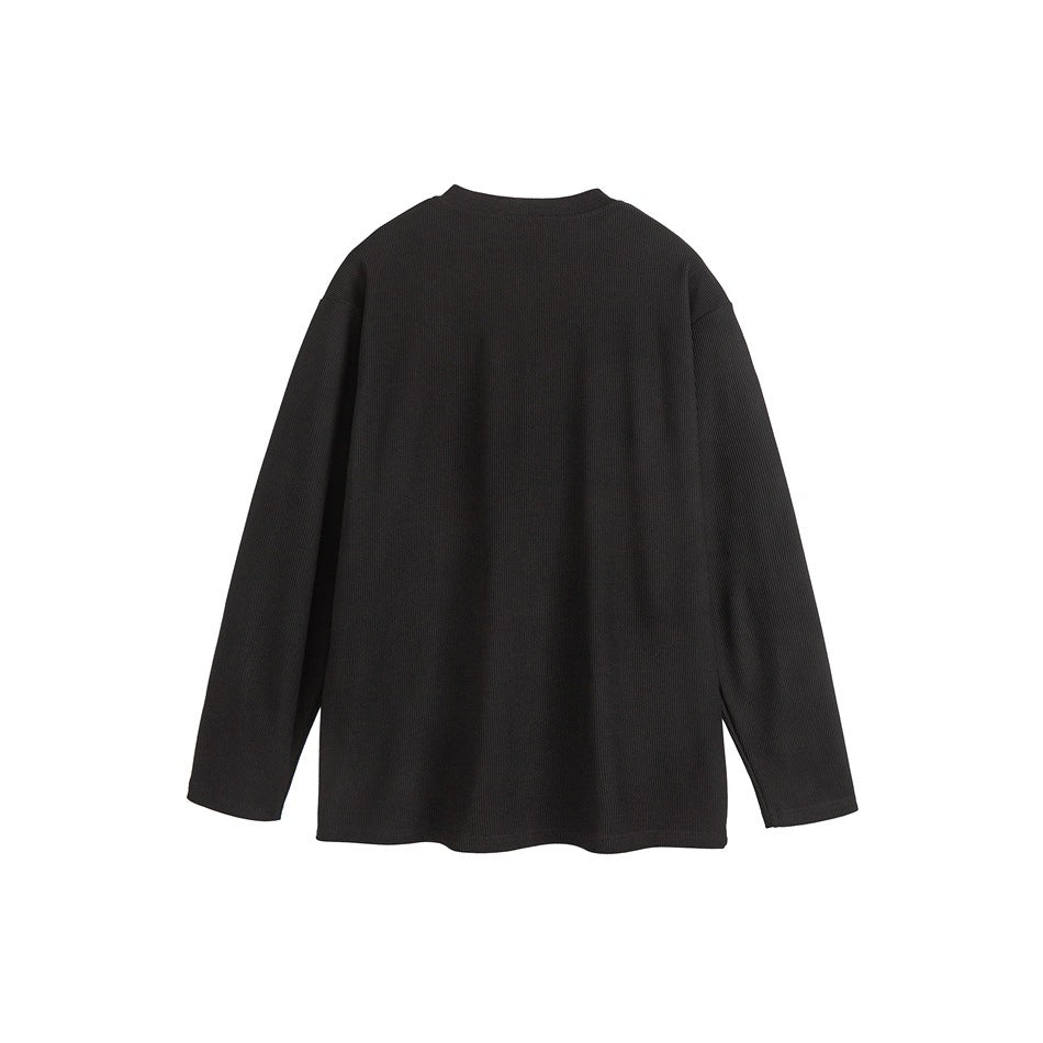 Back view of a black long-sleeve crew-neck top with a straight hem on a white background.
